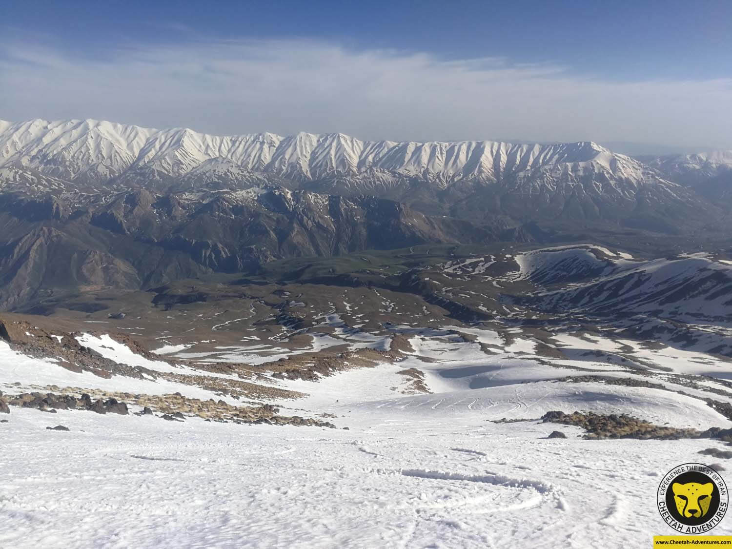 6-7 skiing down to goosfandsara doberar range at the background damavand ski touring