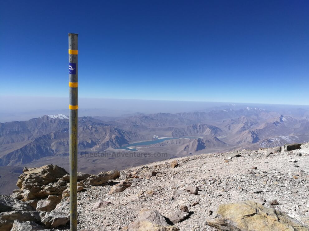 On the top of the Damavand fake summit, beginning of the sulfur hill at 5350m, Lar Lake at the background